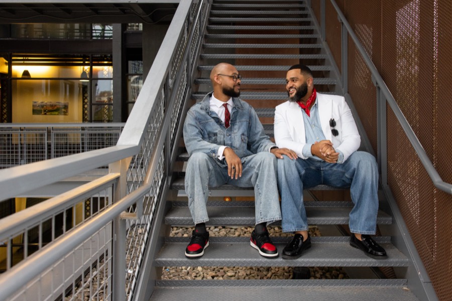 Sitting together on a steel staircase